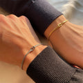 Orion Infinity Bracelet in Silver and Gold — double-strand titanium knot bracelet