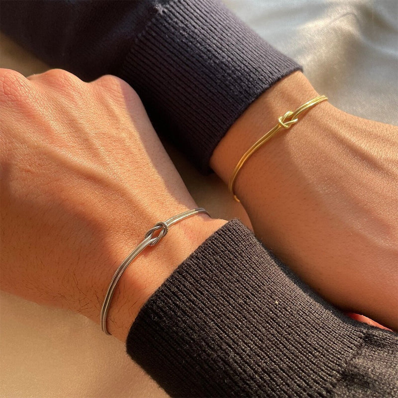 Orion Infinity Bracelet in Silver and Gold — double-strand titanium knot bracelet